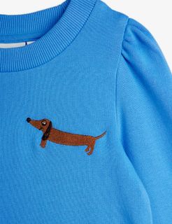 Blue sweatdress featuring a ribbed neck, puffed shoulders, and a brown dog embroidery on the chest.