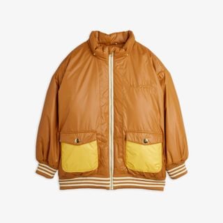 Beige puffer jacket featuring yellow contrast front pockets, striped ribbed trims, and a white zipper closure.