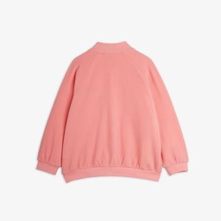 Pink jacket shown from the back, with raglan sleeves and ribbed trims.