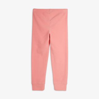 Pink trousers with an elasticated waist and ribbed cuffs, shown from the back.