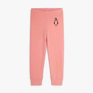 Pink trousers featuring a penguin embroidery on the hip, elastic waist, and cuffed legs.
