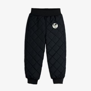 Black quilted outerwear trousers featuring a Ritzratz patch, elasticated waist, and ribbed hems.