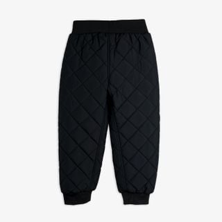 Black diamond-quilted outerwear trousers with an elasticated waist, shown from the back.