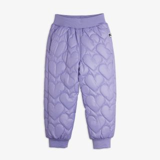 Purple quilted outerwear trousers featuring a heart pattern and elasticated waist and leg ends.