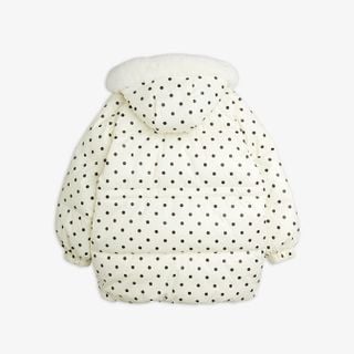 Off-white heavily-padded puffer jacket with black polka dots and a faux fur-lined hood, shown from the back.