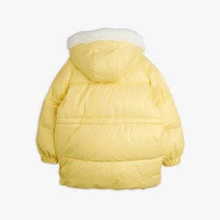 Yellow heavy puffer jacket seen from the back with a white-lined hood.