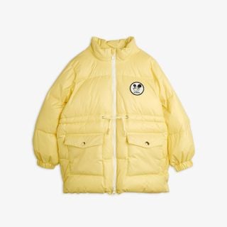 Yellow heavy puffer jacket featuring a Ritzratz patch, white zipper, and front flap pockets.