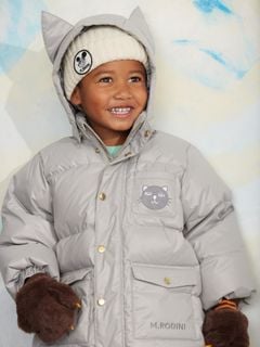Grey heavy puffer jacket with a cat face patch and a hood featuring cat ears.