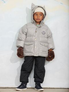 Grey puffer jacket featuring a cat face patch, front flap pockets, and snap buttons.