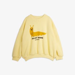 Yellow sweatshirt featuring a Velvet worm print with text and ribbed trims.