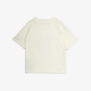 Off-white short-sleeved t-shirt viewed from the back.