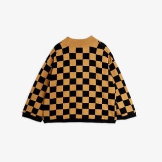 Brown and black Chess check knitted sweater featuring dropped shoulders and ribbed trims, shown from the back.