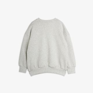 Grey melange sweatshirt featuring ribbed trims and dropped shoulders, seen from the back.