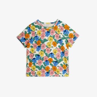 White short-sleeved top featuring a colorful all-over Viola floral print.