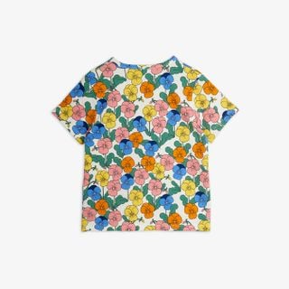 Short-sleeved T-shirt featuring a vibrant all-over Viola flower print, shown from the back.