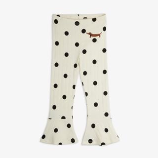 Off-white flared trousers featuring a black Dots print and an embroidered dog motif.