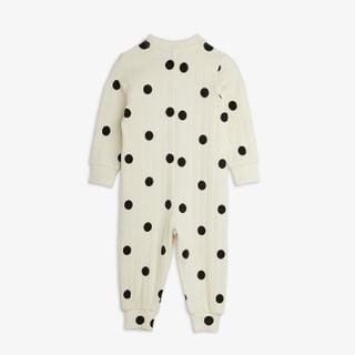 Off-white ribbed jumpsuit with a black Dots print, shown from the back.