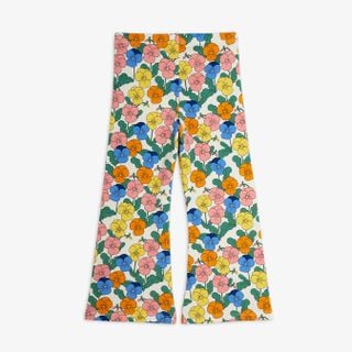 Flared trousers featuring a multi-colored Viola floral print and an elastic waist.