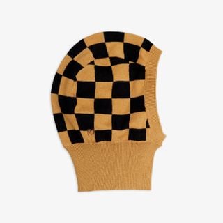 Brown and black knitted balaclava featuring a Chess check pattern, ribbed face opening, and M.R embroidery.