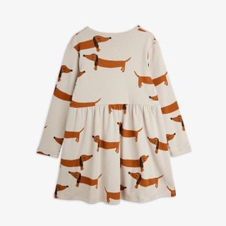 Grey long-sleeved dress with an all-over print of brown dachshund dogs and a gathered waist.