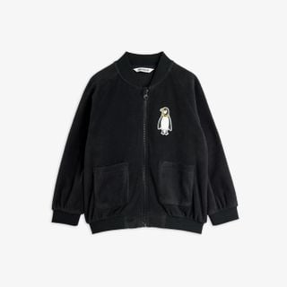 Black microfleece jacket featuring a penguin patch, zipper closure, front pockets, and ribbed trims.