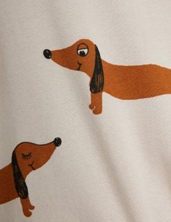 Brown dachshund dog print on a light grey background, featuring black ears and nose details.