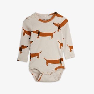 Grey long-sleeved bodysuit with a brown Dog print and snap buttons at the shoulder.