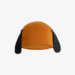 Brown baby beanie with a fold-up brim and attached black floppy dog ears.
