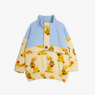 Yellow and blue fleece half-zip sweater featuring a Rabbits print, high collar, and elasticated trims.
