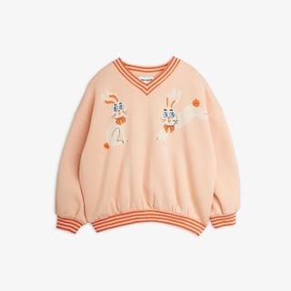 Pink organic cotton V-neck sweatshirt with the Rabbits print and orange and white striped ribbed trims.