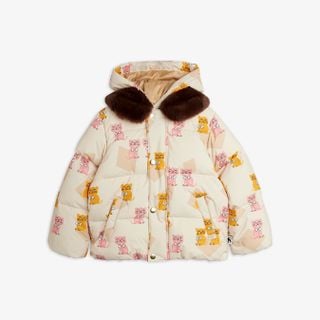 Off-white padded puffer jacket with a pink and yellow Kittens print, brown faux fur collar and gold snap buttons.