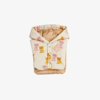 Beige padded hood featuring a pink and orange Kittens print and three gold snap buttons.