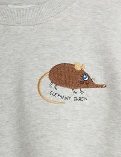 Elephant shrew embroidery detail on a grey melange sweatshirt.