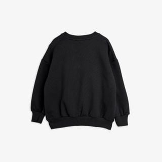 Black sweatshirt shown from the back with dropped shoulders and ribbed trims.