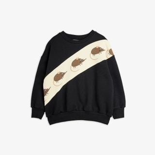Black sweatshirt with a diagonal cream panel featuring an Elephant shrew print and ribbed trims.