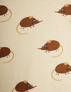 Close-up of the beige fabric featuring a repetitive Elephant shrew print with brown animals and blue eyes.