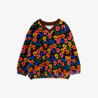 Velour sweatshirt with a colorful Viola flower print, featuring a brown ribbed V-neck and elasticated cuffs.
