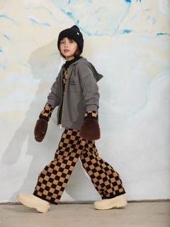 Grey zip-up hoodie with an embroidered chest pocket, worn by a child with a checkered outfit and brown mittens.