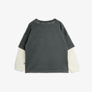 Grey long-sleeved t-shirt from behind featuring off-white layered sleeves and a ribbed neckline.