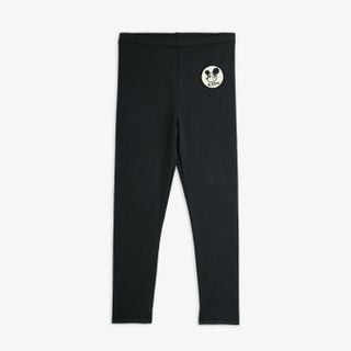 Black organic cotton leggings featuring a Ritzratz character patch on the upper leg.