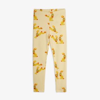 Pale yellow leggings featuring an all-over Rabbits print and a stretchy elastic waistband.