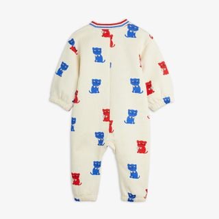 Off-white baby bodysuit with a red and blue Kittens print and a striped ribbed neckline.