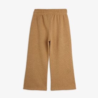 Brown melange organic cotton sweatpants with an elasticated waistband and wide legs, back view.