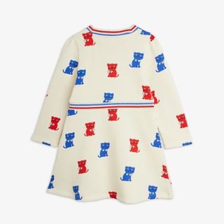 Off-white long-sleeved sweatdress featuring a red and blue Kittens print and striped ribbing at the waist and neck.