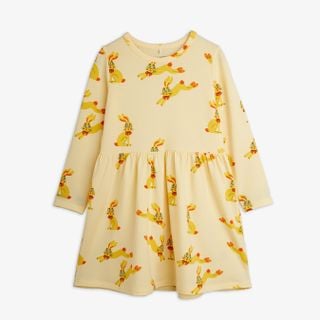Yellow long-sleeved dress with an all-over Rabbits print, gathered waist, and shoulder buttons.