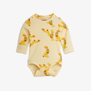 Yellow long sleeve bodysuit with Rabbits print and snap buttons at the shoulder and crotch.