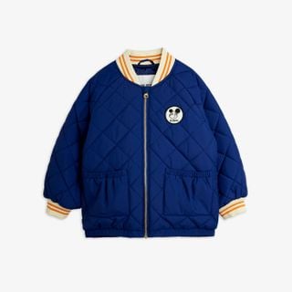 Blue quilted puffer jacket with a Ritzratz patch, gold zipper, front pockets, and striped ribbed trims.