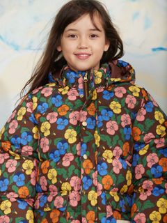 Brown heavy puffer jacket featuring a colorful Violas print and a hooded design, worn by a child.