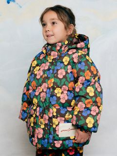 Brown heavy puffer jacket featuring a colorful Violas print, worn by a child.