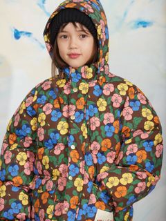 Brown heavy puffer jacket featuring a colorful Violas print and a hood, worn by a child.